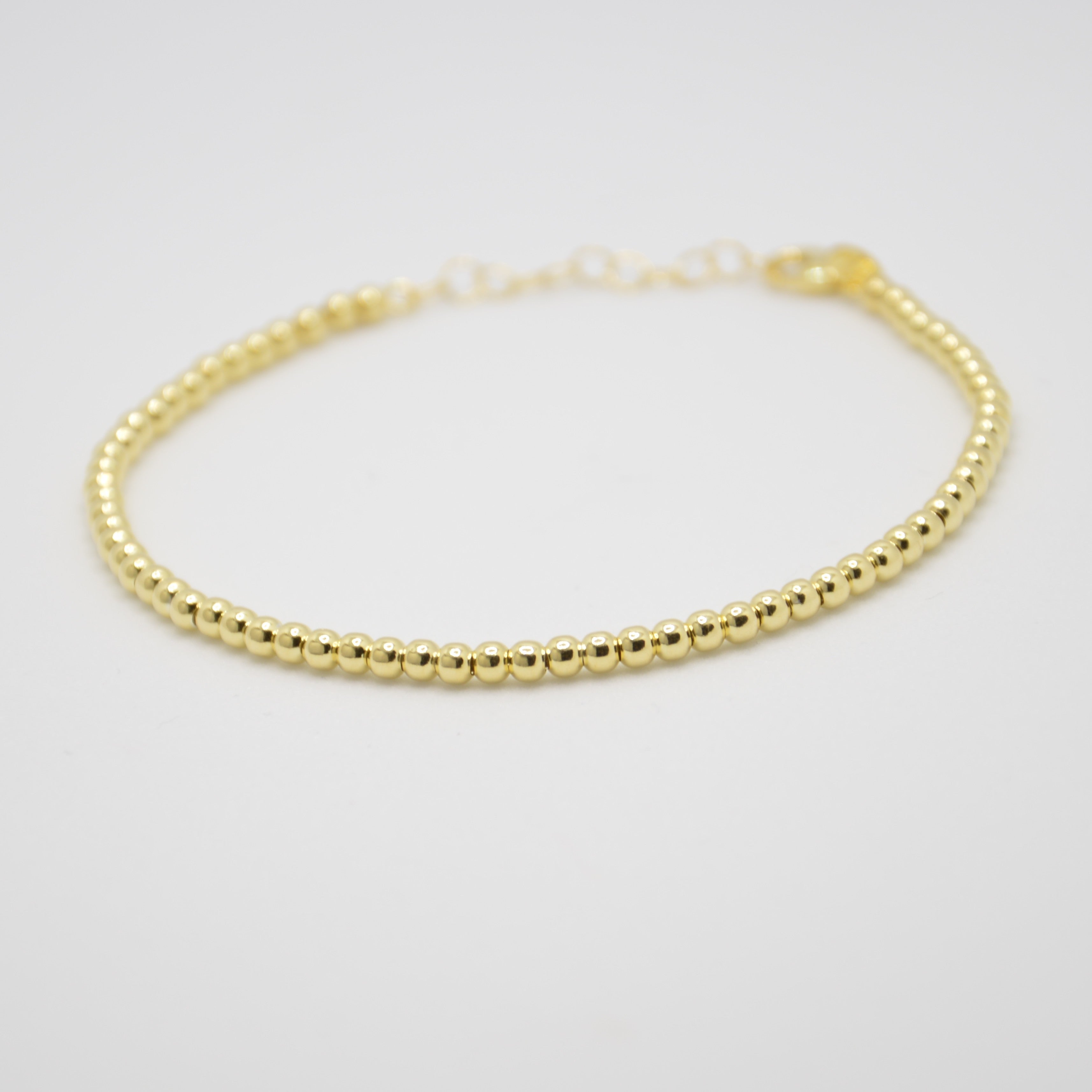 BRACCIALE SFERE - DORATO
