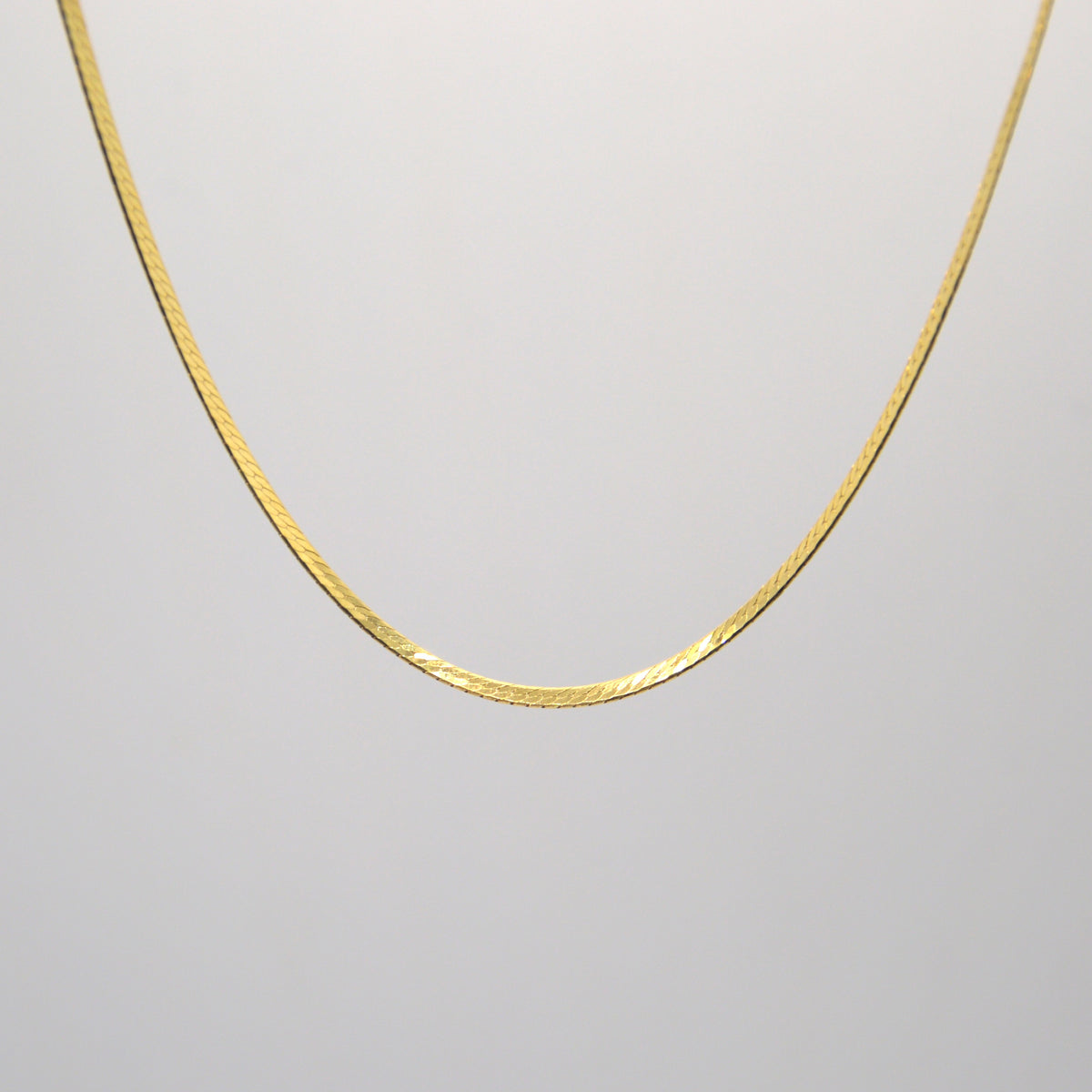 Collana maglia piatta snake placcata oro