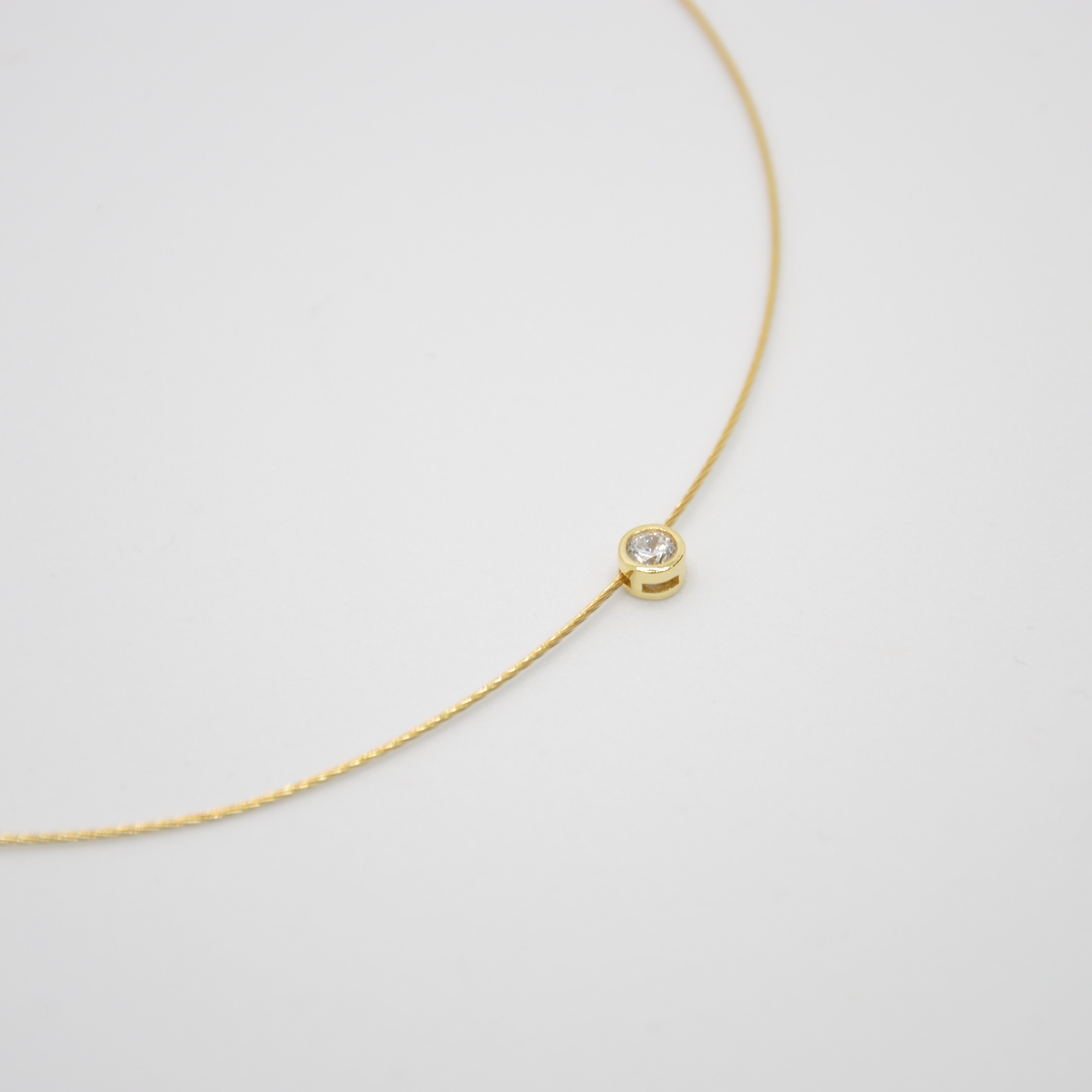 COLLANA PUNTO LUCE DORATA