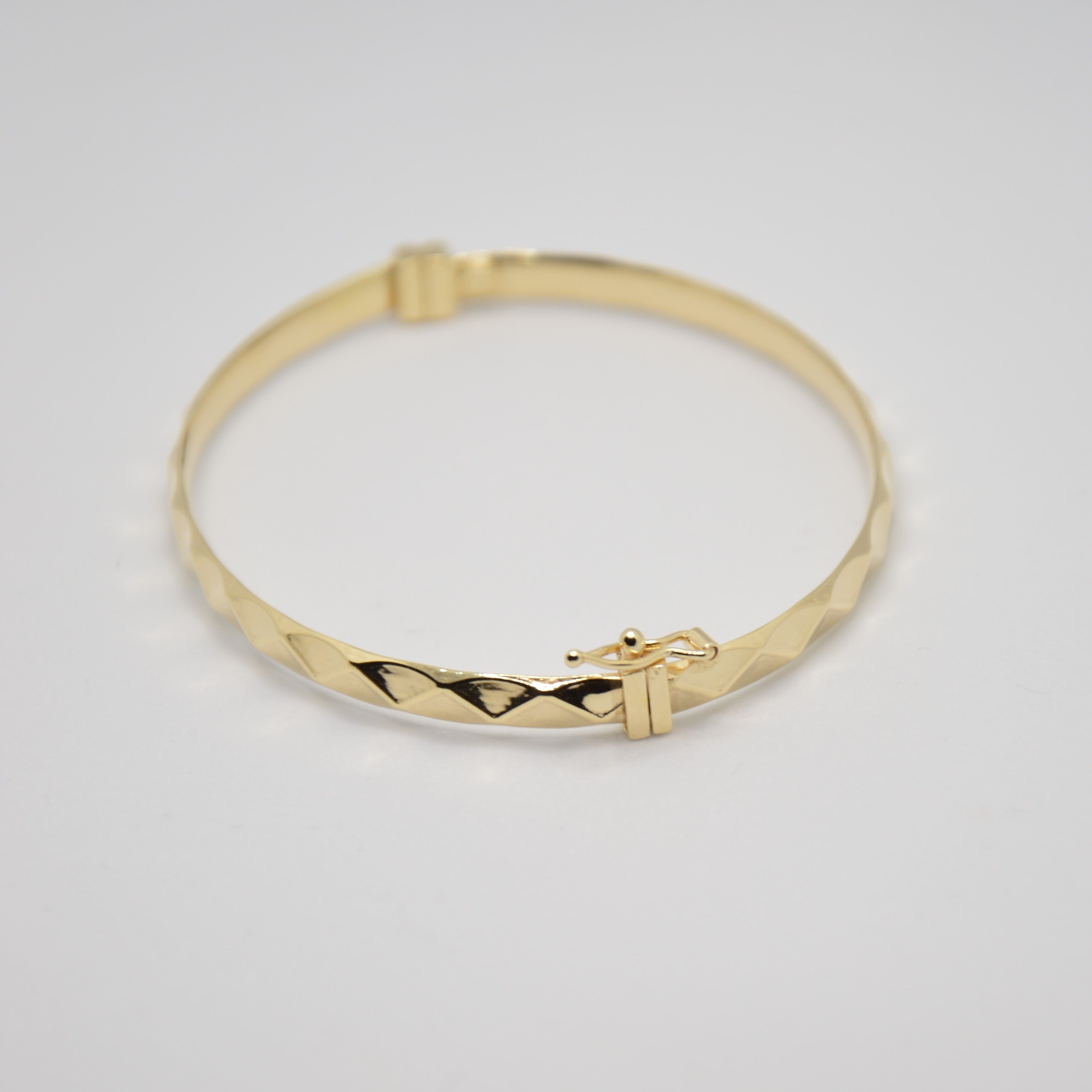 BRACCIALE RIGIDO SFACCETTATO