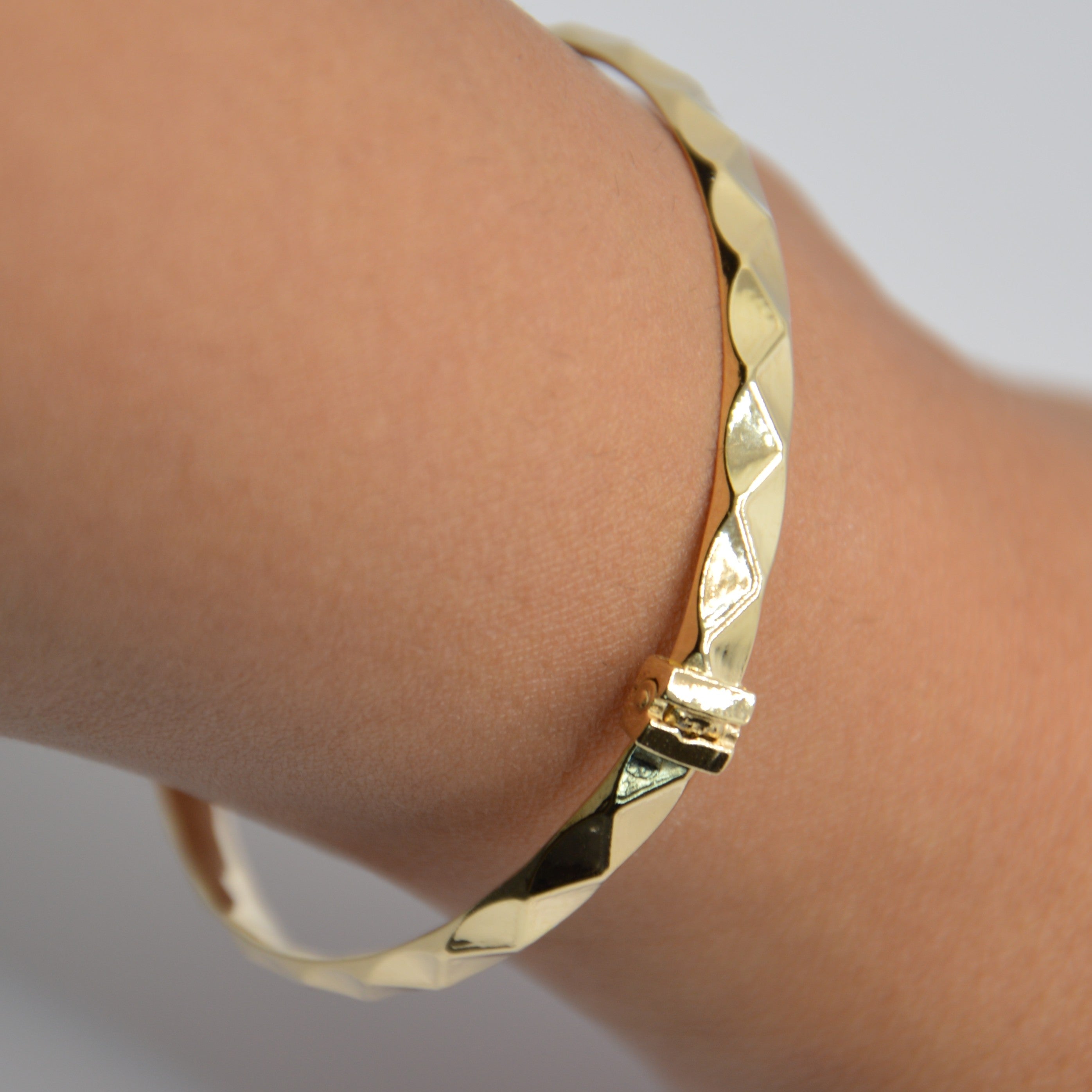 BRACCIALE RIGIDO SFACCETTATO